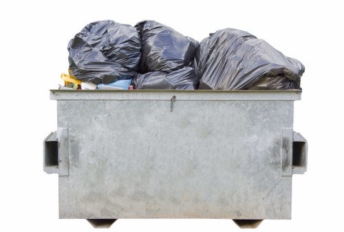 Residential skip container placed in a Waterloo garden for waste disposal