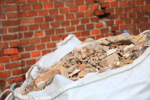 Residential project site with a hired skip